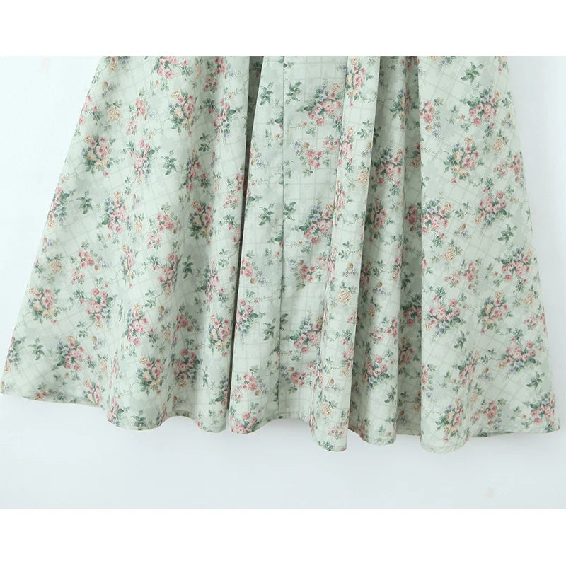 Aina - green floral print midi dress with spaghetti straps