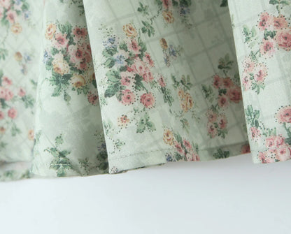 Aina - green floral print midi dress with spaghetti straps