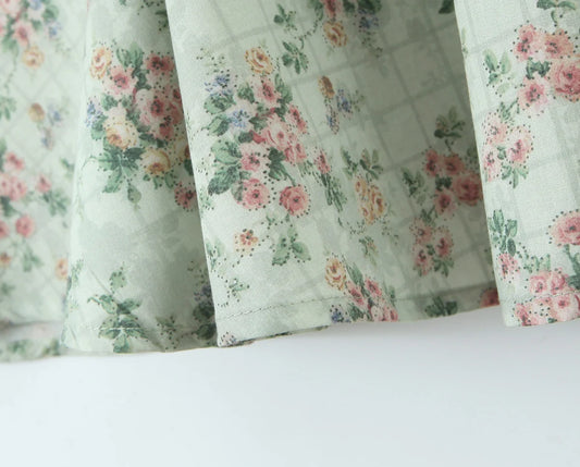 Aina - green floral print midi dress with spaghetti straps